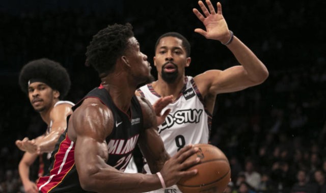  巴特勒关键盖帽热火险胜篮网迎来三连胜